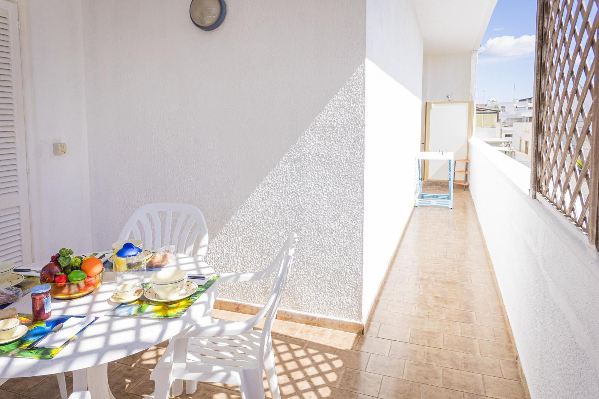 Torre Lapillo Apartment Sea View - Happy Rentals Порто Чезарео Екстериор снимка